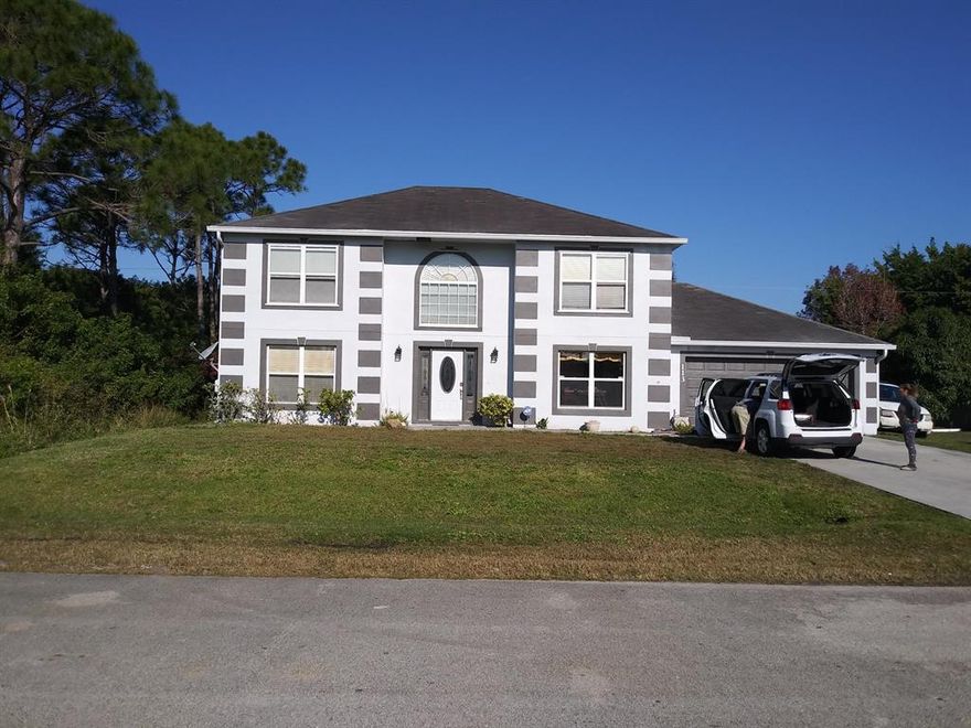 Downstairs: Recently remodeled. Fresh Paint inside and out. New  GE appliance package include  S/S SS refrigerator, slide in  Black-glass top convection  range, microwave & dishwasher with new warranties. New LED 
lighting in kitchen with no light bulbs to change for up to 10 years. Dining Room has crown molding and wainscoting  new wood look  washable laminate floors.  Den with french doors to office etc.  Walk out to Patio and stunning  large screened  pool w/ 2 spa sit outs and beautiful landscaped & stone waterfall. Fenced yard and 2 car garage 
Upstairs: 4 bedrooms all  newly painted. new carpets. Three new LED Ceiling fans. Both Bathrooms recently remodeled. New tile Vanity.  Walkout of  master bath room to deck overlooking pool.