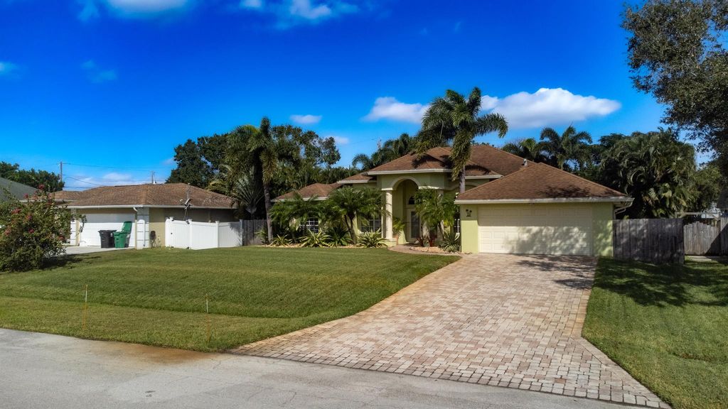 Photo of 463 SW Ryder Road, Port Saint Lucie, FL 34953 (MLS # R10941877)