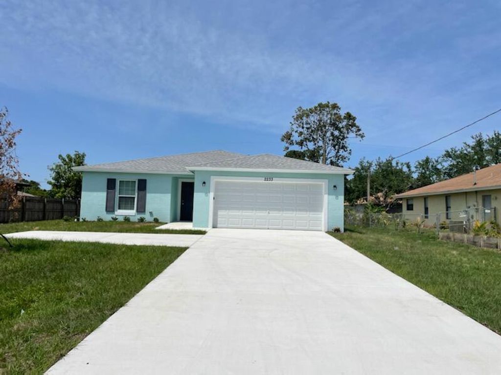 Photo of 2233 SE Melaleuca Boulevard, Port Saint Lucie, FL 34952 (MLS # R10790730)