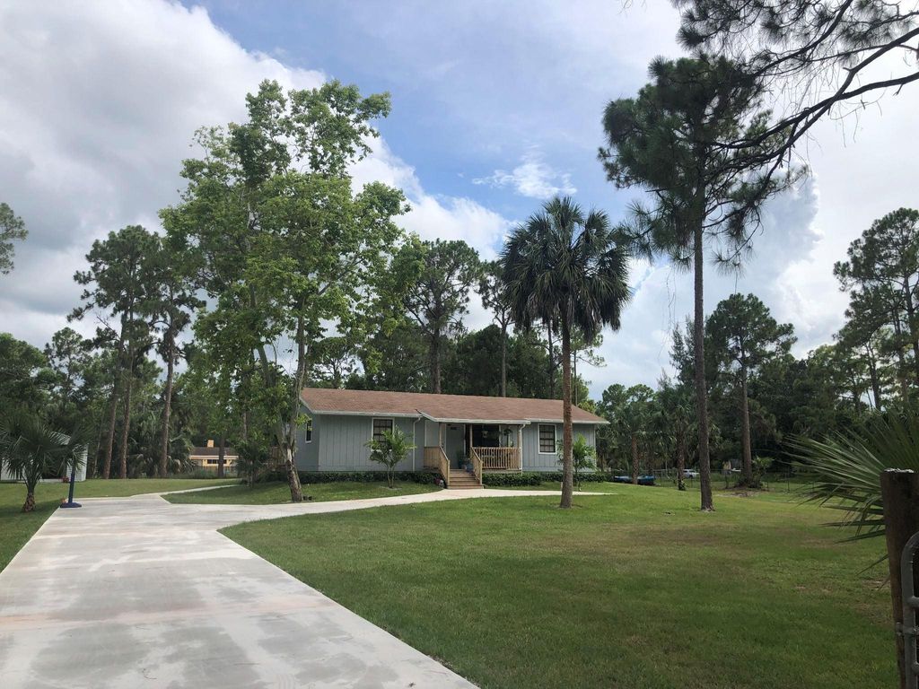 Photo of 13618 N 51st Place, West Palm Beach, FL 33411 (MLS # F10550152)