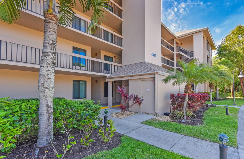 Photo of 4440 NE Sandpebble Trace #104, Stuart, FL 34996 (MLS # B26008490)