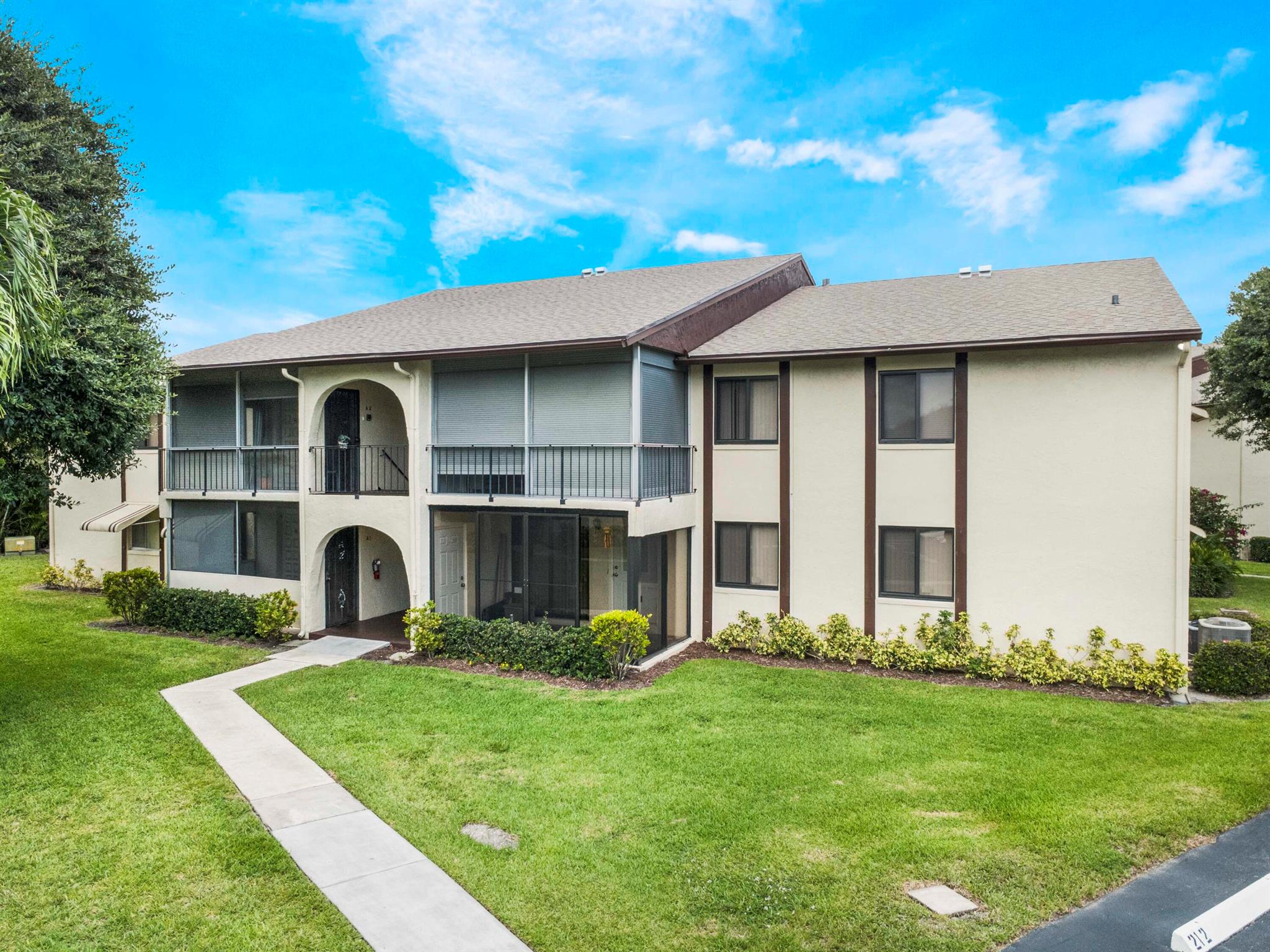 Welcome to La Pinata, a peaceful 55+ community.This 2-bedroom, 1.5-bath first-floor unit is attractively priced and ready for you to make it your own. Enjoy the glass enclosed front porch/sunroom with new windows installed in 2025, perfect for relaxing with morning coffee. Inside, you'll find tile flooring throughout - no carpet! The kitchen offers a large walk-in pantry, and there's an in-unit utility/laundry room with a washer and dryer just 1.5 years old.Community amenities include a pool, clubhouse, and shuffleboard. Existing furniture can remain or be removed at your preference.