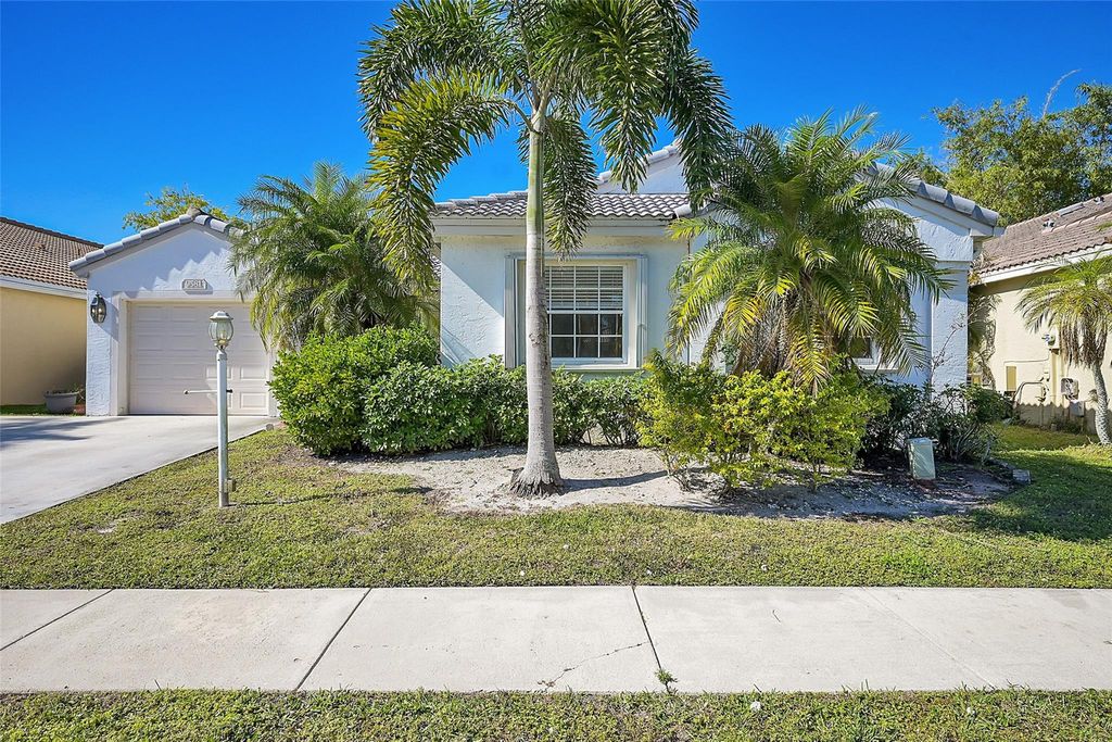 Photo of 9581 Tavernier Drive, Boca Raton, FL 33496 (MLS # F10480433)