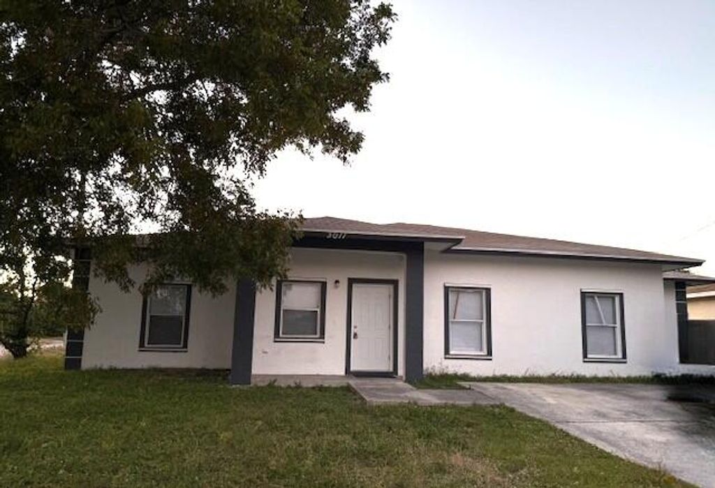 Photo of 3011 Avenue M, Riviera Beach, FL 33404 (MLS # R11160331)