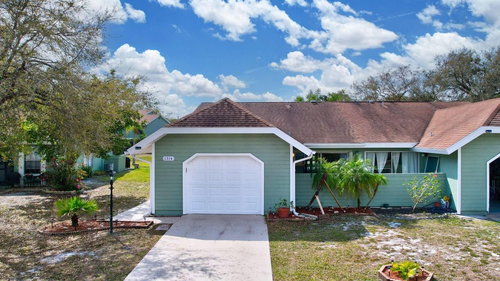 Photo of 1314 SE La Haven Court, Port Saint Lucie, FL 34952 (MLS # R10957386)
