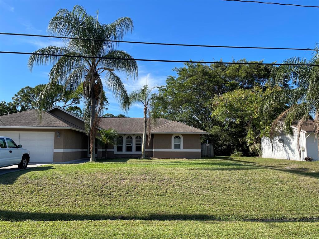 Photo of 675 SW Todd Avenue, Port Saint Lucie, FL 34983 (MLS # R10800238)