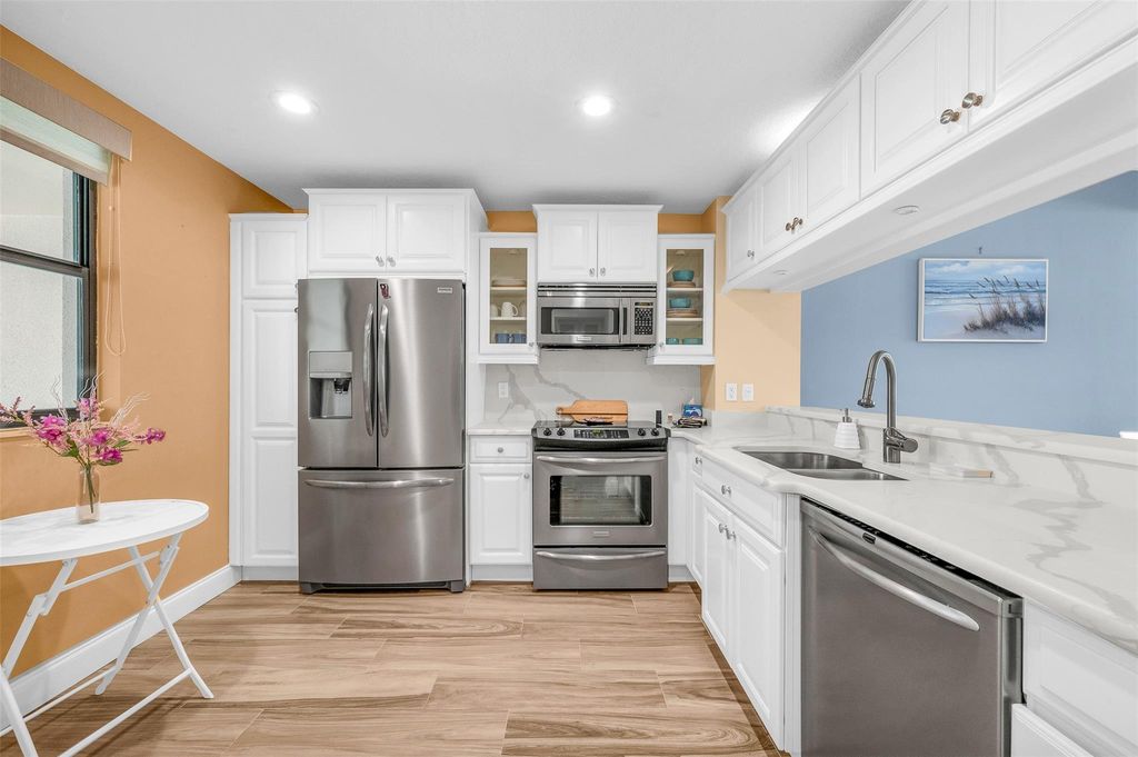 Photo of 827 Oak Harbour Drive #827, Juno Beach, FL 33408 (MLS # F10516388)