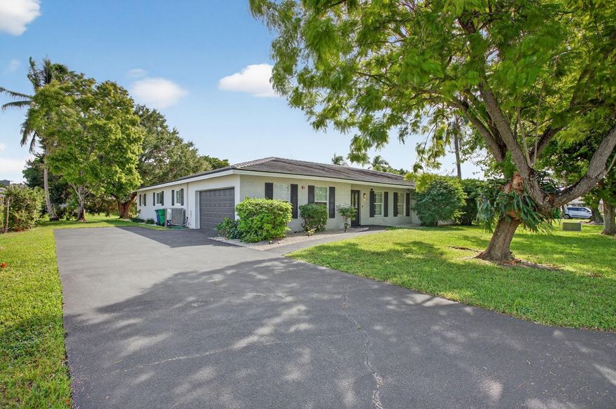 Welcome to this beautifully updated 5-bedroom, 3-bath home in the heart of Coral Springs! Enjoy an open layout with modern finishes, Calacatta countertops, porcelain tile floors, impact windows, and a 2023 roof. The backyard is made for relaxing or entertaining with a sparkling pool, cabana bathroom and peaceful canal views. Furniture is negotiable, and the home is Airbnb and small ALF (Assisted Living Facility) ready— great for living or investment. With no HOA and a two-car garage, this move-in ready home checks all the boxes!