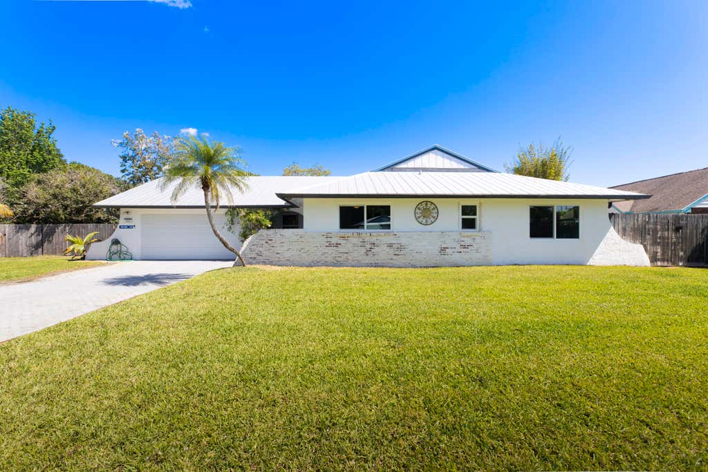 Photo of 821 NE Town Terrace, Jensen Beach, FL 34957 (MLS # R10975947)