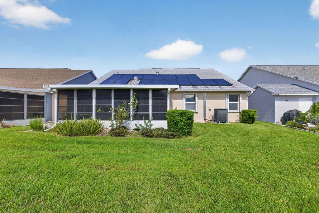 Photo of 1060 NW Tuscany Drive, Port Saint Lucie, FL 34986 (MLS # B26082341)