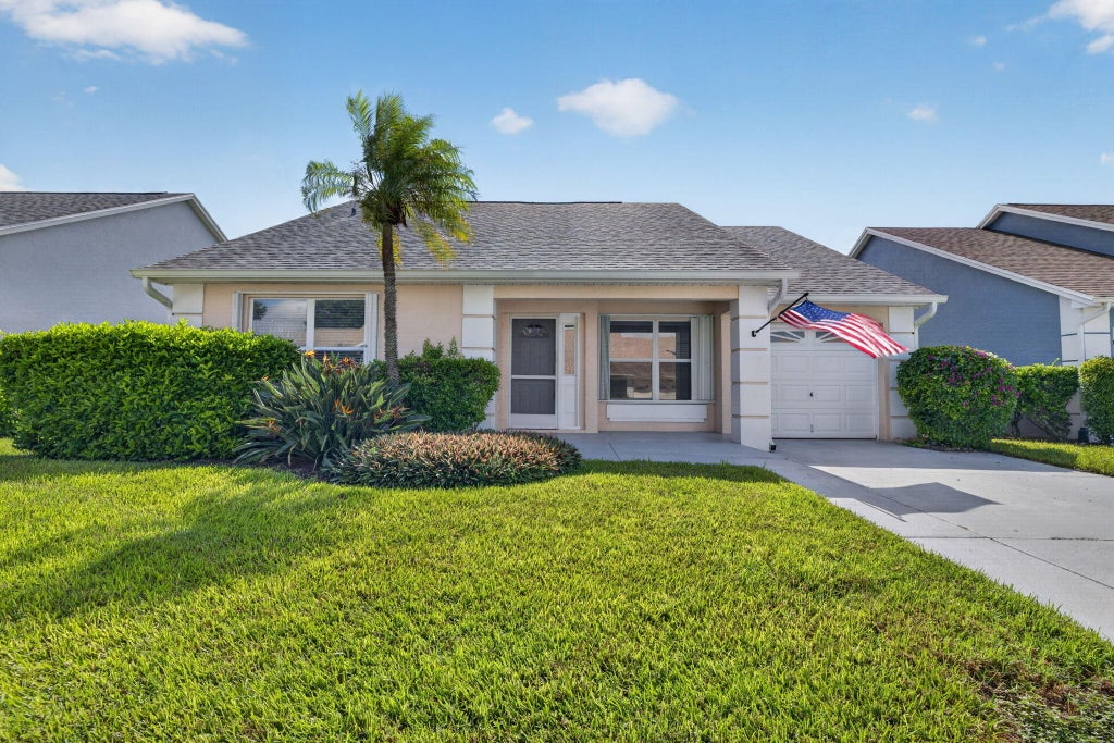 Photo of 1060 NW Tuscany Drive, Port Saint Lucie, FL 34986 (MLS # B26082341)
