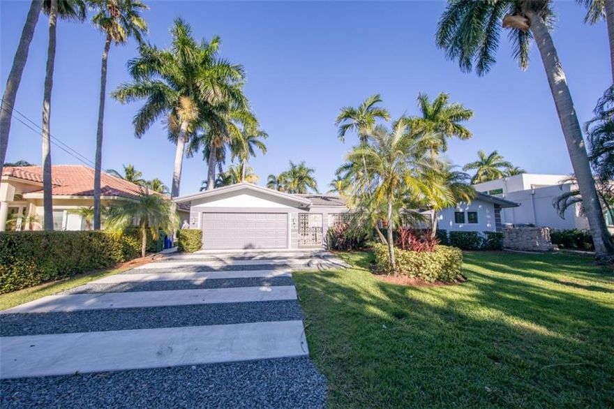 The house you're looking for! Live is beautiful Seven Isles. The lowest price home in the neighborhood.  Beautifully renovated and maintained with new roof, hurricane impact windows, back up generator, new pool system, new air conditioning. Desirable north facing backyard on large 10,625 foot lot (85 feet of seawall)  New 13,000 pound boat lift, new flooring, new fresh paint inside and outside. Many more upgrades to mention.  Move in condition.  Take the first step.