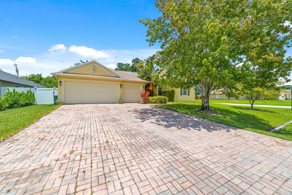 Photo of 1373 SW Bartell Avenue Ave, Port Saint Lucie, FL 34953 (MLS # R10810948)