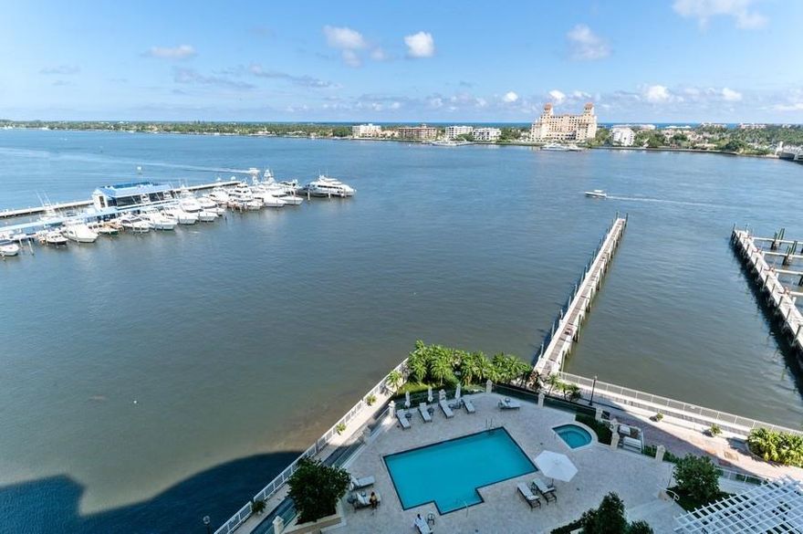 Beautiful four bedroom four and half bath residence with over 5,000 +/- sq. ft., overlooks the intracoastal waterway, Palm Beach and City Views. Every exquisite detail can be seen throughout from the grand salon, spacious master suite w/den, gourmet kitchen & family room. The three guest bedrooms, privately located are complete w/baths ensuite and terraces. With only 48 properties in this luxury condominium, service is as its best. Every amenity is offered from full time manager, concierge, valet parking, fully equipped gym, movie theatre, entertainment room, board room, waterside pool and private elevator opens to your own home. The best in condominium living in a great location.