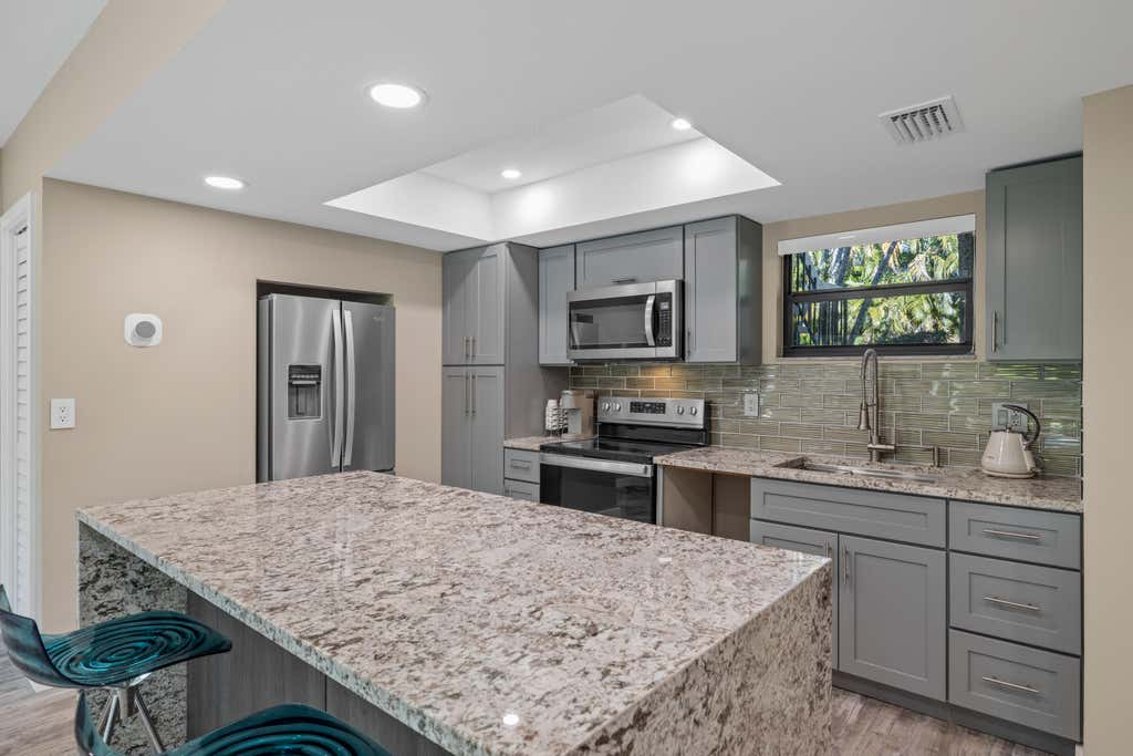 Photo of 11863 Wimbledon Circle #438, Wellington, FL 33414 (MLS # B26052288)