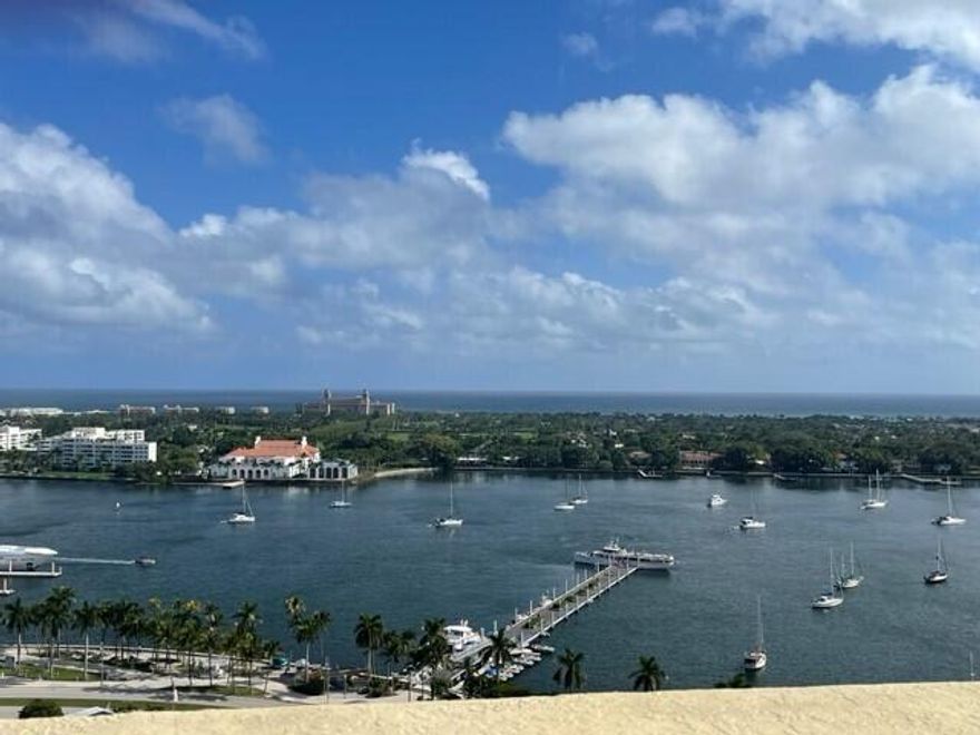 One of a kind magnificent ''home in the sky'' offering spectacular direct views of the intracoastal, Palm Beach & the Atlantic Ocean. Featuring over 5,000 square feet of indoor living space. Spacious master bedroom with sitting area. 2 guest suites;1 with kitchenette, family room, office, theater, wine room, brand new state of the art kitchen, breakfast room, dining area, an expansive living room with two large balconies; 6 balconies total with unit. Professionally decorated and includes exquisite custom finishes & fully furnished except for specified exclusions. Amenities include elevator foyer, 24-hour concierge service, valet parking, fitness center and an impressive rooftop with sky club, pool, lush gardens and a panoramic 360 degree view. 2 parking spaces