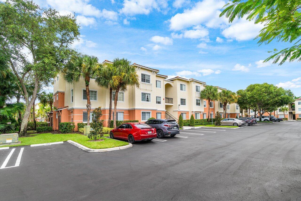 Do not miss your opportunity to own a beautiful condo centrally located in the city of West Palm Beach, only minutes away from Palm Beach International Airport, I-95, the Florida Turnpike. The unit is move-in-ready with 2 bedrooms, 2 baths, large balcony, pool views, wood floors throughout, hurricane impact windows, roof replaced in 2022, AC replaced in 2023. Enjoy top-rated schools and resort-style living with a gym, pool, volleyball court, playground, car wash area, and so much more. HOA covers exterior building/insurance, pest control, water, trash, and gated entrance. Prime location near shopping, dining, and major highways, Vacant and easy to show