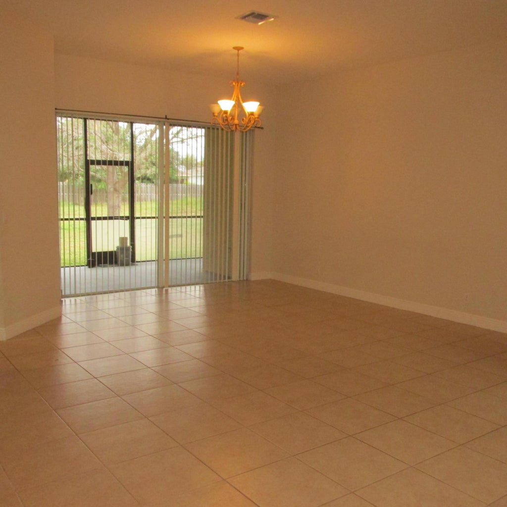 Photo of 3413 SW San Benito Street, Port Saint Lucie, FL 34953 (MLS # R11138596)