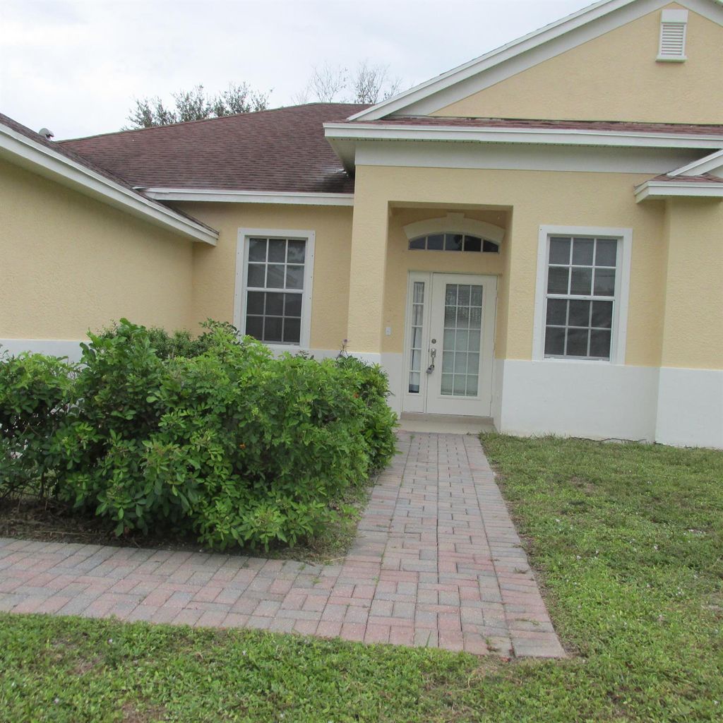 Photo of 3413 SW San Benito Street, Port Saint Lucie, FL 34953 (MLS # R11138596)