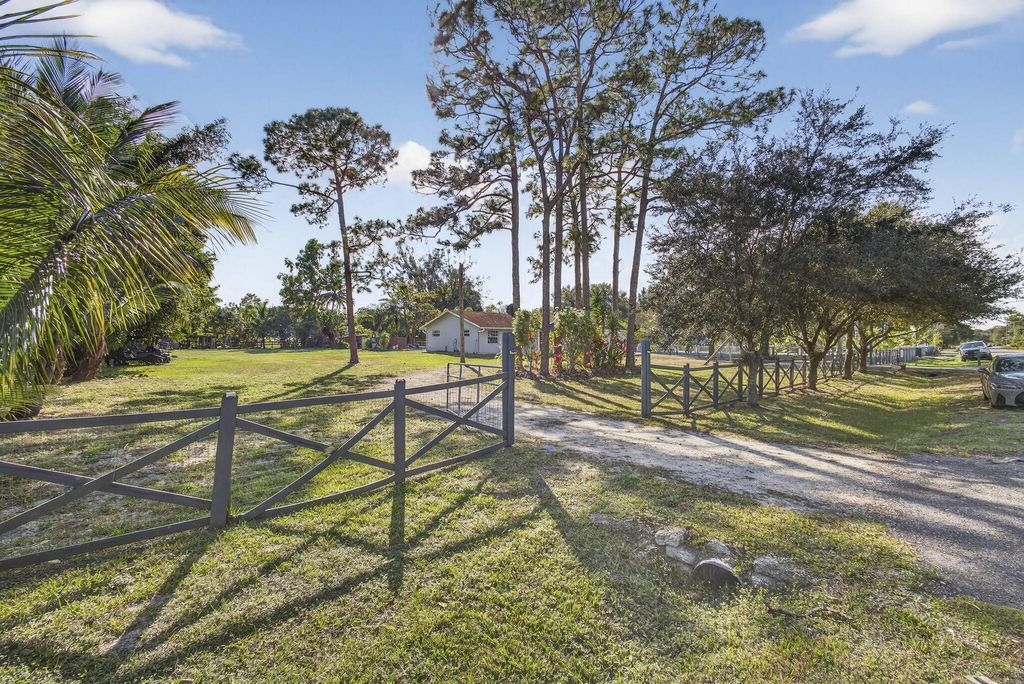 Photo of 16318 E Glasgow Drive, The Acreage, FL 33470 (MLS # R11147278)