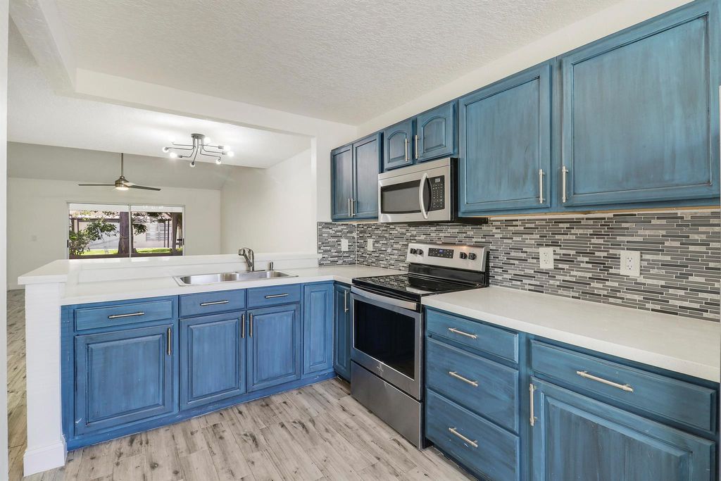 Photo of 188 Pinewood Court, Jupiter, FL 33458 (MLS # R11095360)