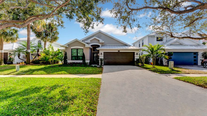 Welcome to 535 Enfield Court in Delray Lakes, the only gated community east of I-95 in Delray Beach. This beautifully updated 4 bedroom, 2 bathroom home offers an open, light-filled floor plan with a remodeled kitchen and oversized island flowing into the main living areas. Features include newly remodeled bathrooms, impact windows and doors (2018), a 2018 metal roof, new hurricane-impact garage door and opener, new sprinkler system, landscaping, and washer/dryer. The screened patio with built-in BBQ grill and burner expands the living space and is ideal for entertaining. The private backyard has room for a pool. Community amenities include a gated entrance, pool, tennis and playground, and the home is just minutes from the Lake Ida boat ramp, Downtown Atlantic Avenue, and the beach.
