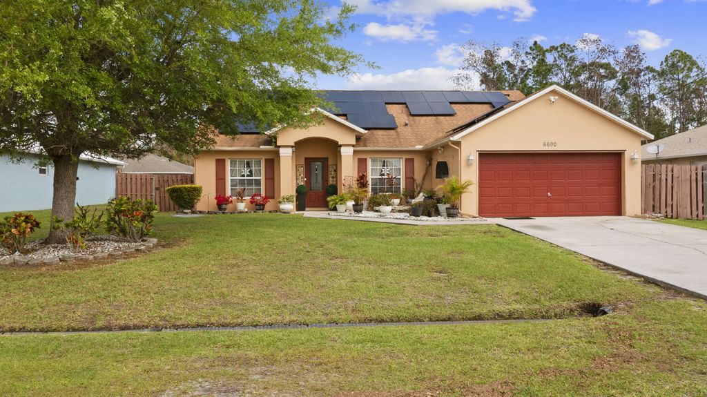 Photo of 6690 NW Pinson Court, Port Saint Lucie, FL 34983 (MLS # B26009673)