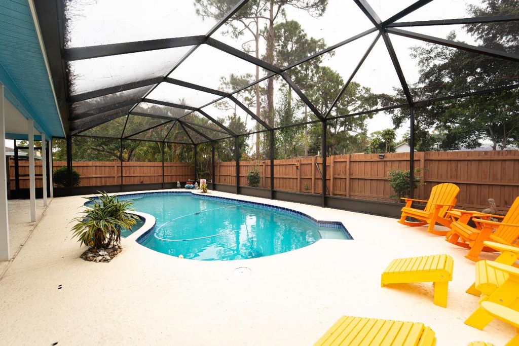 Photo of 751 SE Polynesian Avenue, Port Saint Lucie, FL 34983 (MLS # R11154542)