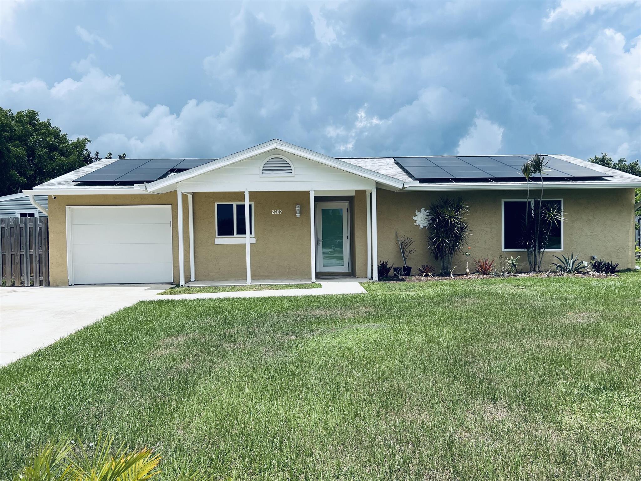 LOCATED ON A LAGOON....LOT .31 OF ACRE 3/2/1 HOME REMODELED...IMPACT WINDOWS & DOORS+ IMPACT GARAGE DOOR, SALT WATER POOL. SOLAR PANELS + ATTIC FAN, NEW 4 YR OLD ROOF, GUTTERS & DOWNSPOUTS, NEW HOT WATER HEATER, NEW CIRCUIT BREAKER BOX, 8 X 10 STORAGE SHED + 2 SMALLER SHEDS, GENERATOR, UPGRADED FANS WITH LITES IN ALL ROOMS, FENCED YARD, BIG PATIOS. NEWER APPLIANCES INCLUDING WASHER & DRYER. BIG OVERSIZED LOT.A REAL GEM EAST OF US 1.NOTE: MUST USE LOCAL LENDERS ONLY