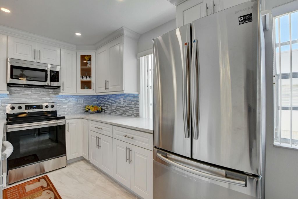 Photo of 988 Normandy Trail #988, Delray Beach, FL 33484 (MLS # B26016074)