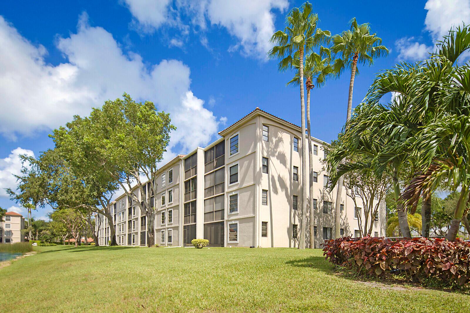 Live every day like you're on vacation in this beautifully designed condo that blends style, comfort, and serene water views. From the moment you step inside, you'll be greeted by a bright, open living space with gleaming tile floors, crown molding, and an airy flow that's perfect for relaxing or entertaining. The elegant dining area sparkles under a crystal chandelier, setting the tone for unforgettable gatherings. The updated kitchen offers plenty of cabinetry, sleek counters, and a pass-through window for easy conversation while cooking. Both bathrooms have been updated to a modern elegant style. Wake up to peaceful water views from the master bedroom, then savor your morning coffee on the screened back patio overlooking the water and lush green space. With its tasteful finishes,