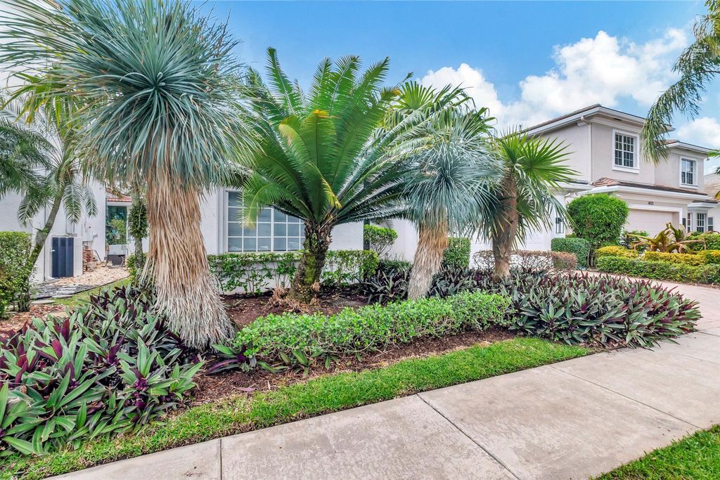Photo of 4114 NW Briarcliff Circle, Boca Raton, FL 33496 (MLS # R11106042)