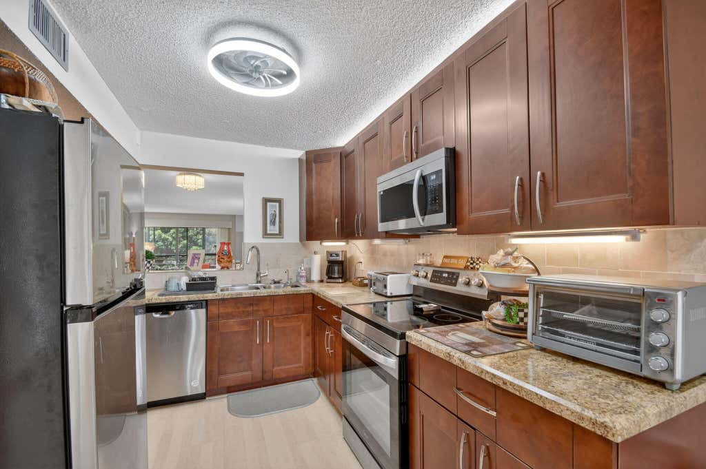 Photo of 10173 Mangrove Drive #204, Boynton Beach, FL 33437 (MLS # B26036406)