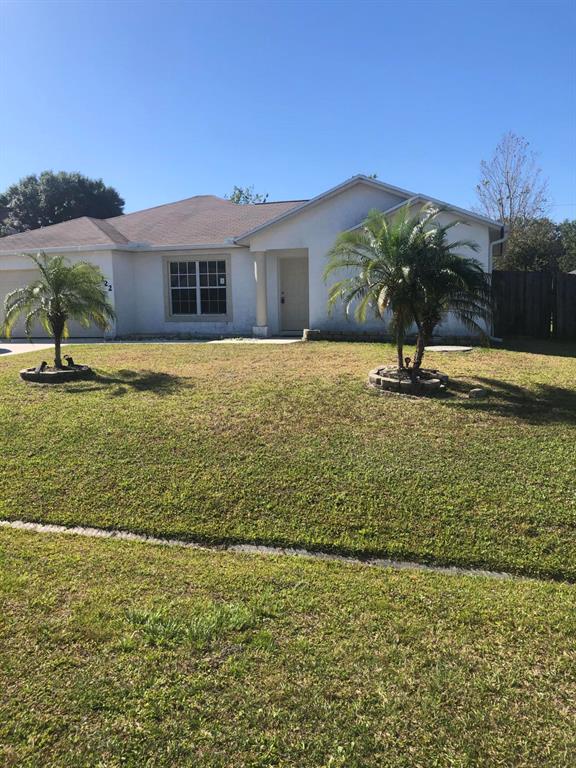 3 BEDROOM NORTH OF PRIMA VISTA, FRESHLY PAINTED, NEW CARPET IN MASTER BEDROOM, TILE IN COMMON AREAS, SCREENED BACK PATIO AND FENCE YARD.