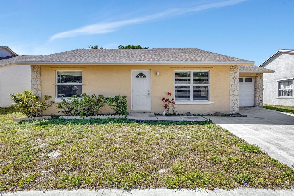 Photo of 5557 Priscilla Lane, Lake Worth, FL 33463 (MLS # R11074682)