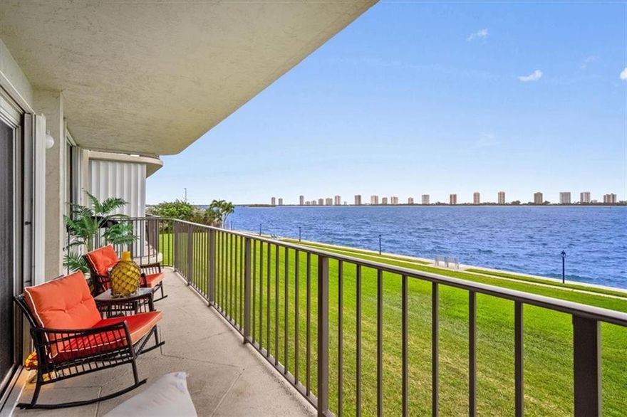 Direct Intercoastal views!! 2nd floor Direct access to pool.  Beautiful spacious 2/2 split plan condo over looking a gorgeous view of the intercoastal right from your patio. The kitchen boats all new quartz countertops and wood cabinets. New washer and dryer combo and newer a/c unit and updated guest bath. Wood laminate floors and tile throughout. Spacious Master bedroom with walk in closet. Community is  55+.  1 assigned covered parking space and extra storage space. Private gated community with many amenities which include:  2  pools, entertaining areas, grills, shuffle board, putting green, and social room.