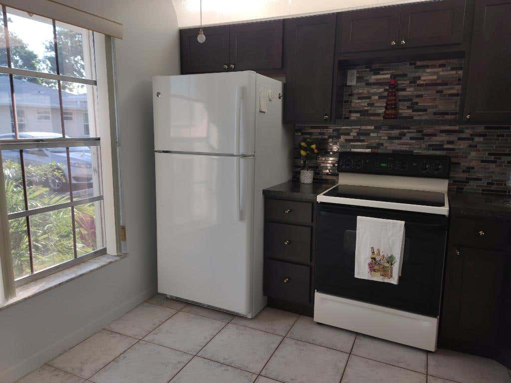 Photo of 369 Bennington Lane, Lake Worth, FL 33467 (MLS # R11089498)