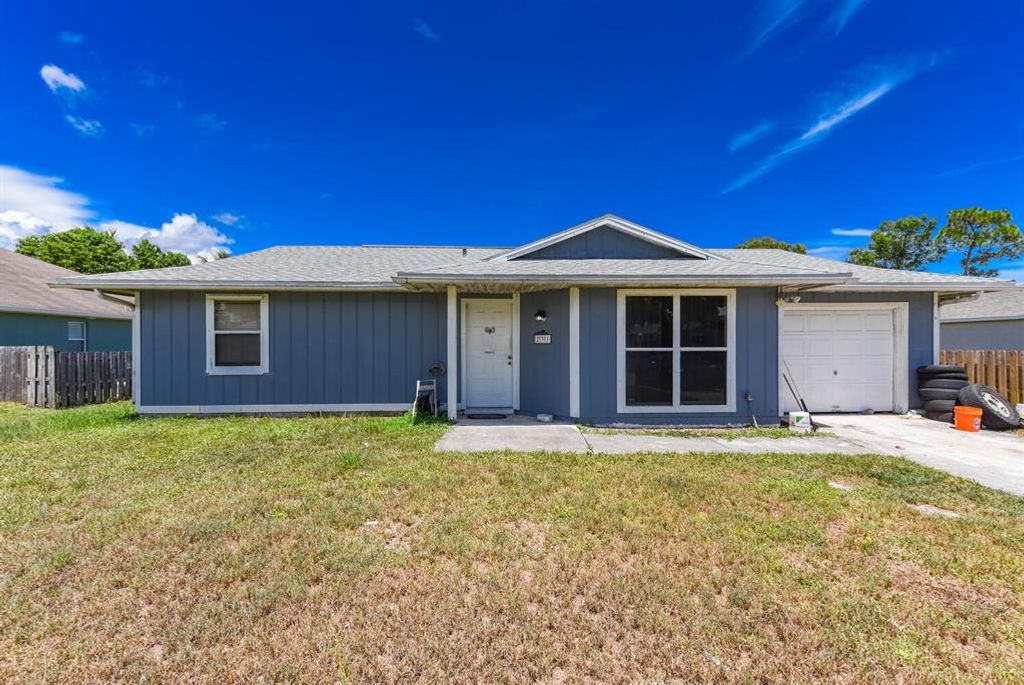Photo of 231 SW Statler Avenue Ave, Port St Lucie, FL 34984 (MLS # R10826676)