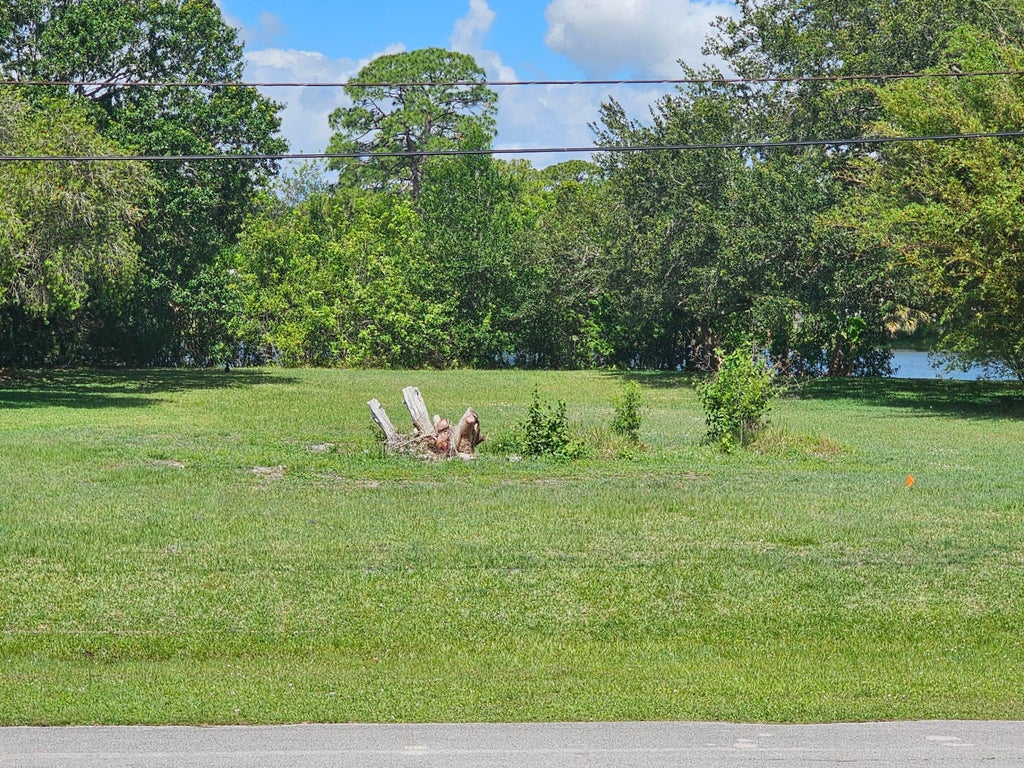 Photo of 5707 University Lane, Fort Pierce, FL 34951 (MLS # B26029219)