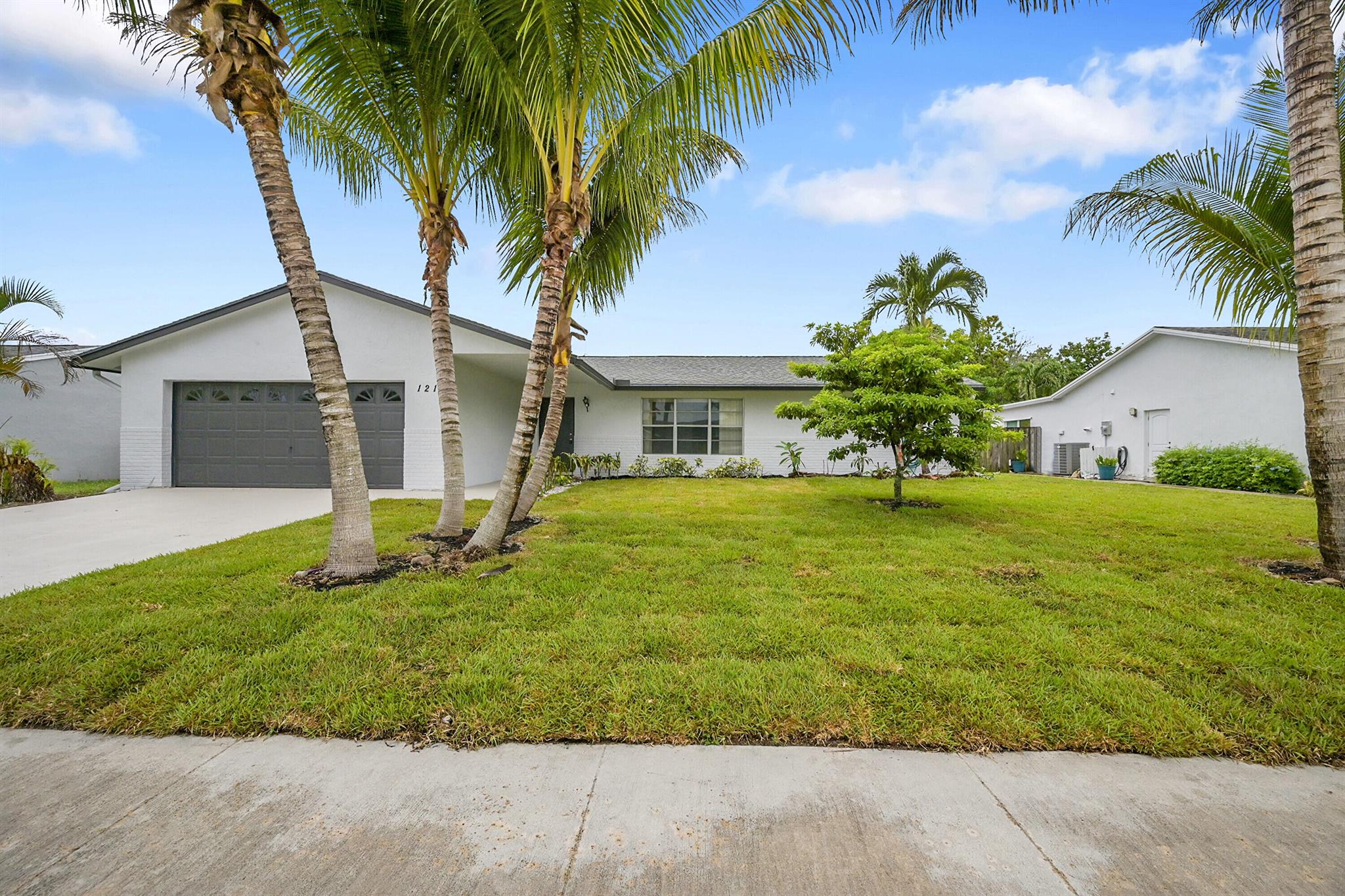Location Location!This charming 3-bedroom, 2-bath, 2-car garage home offers the ideal Florida lifestyle in a friendly neighborhood and top-rated school zone. Step inside to a spacious, light-filled living and dining area with oversized windows that welcome in the Florida sunshine. The cozy family room opens to a large, enclosed sunroom--an ideal space for entertaining or relaxing outdoors. The expansive backyard has plenty of room for a pool, offering endless possibilities for gatherings and fun. Enjoy the convenience of being close to great restaurants and shopping.