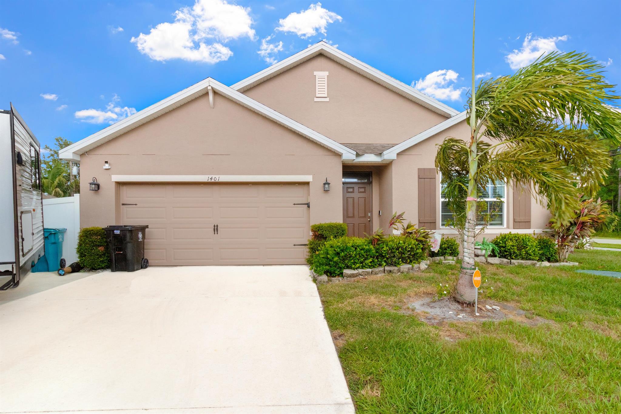 This charming 4-bedroom, 2-bathroom pet-friendly home sits on a spacious corner lot. Designed with a split open floor plan, the home features tile throughout the main living areas and carpet in the bedrooms. The kitchen is well-appointed with stainless steel appliances, a large center island, and plenty of pantry space, making it ideal for everyday cooking and entertaining. A dedicated laundry room adds to the home's functionality and convenience.The primary suite is separate from the additional bedrooms, giving you extra privacy. Smart home features are available, allowing you to easily manage comfort and security with modern technology.