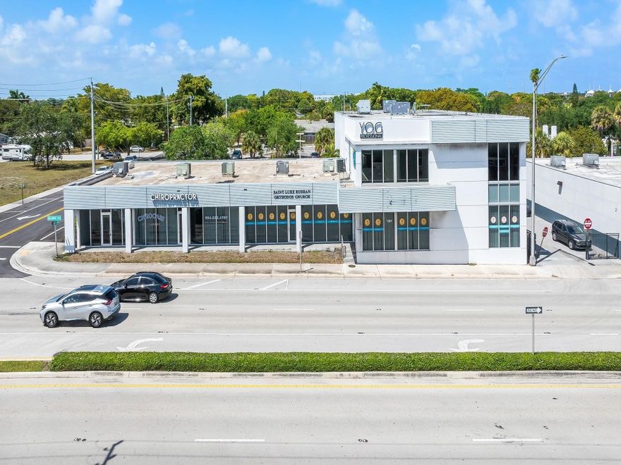 Currently approved for church use but open to office or retail concepts, this prime space in Pompano Beach’s commercial core offers exceptional visibility with direct frontage on a major thoroughfare. Recently renovated, the building features sleek floor-to-ceiling glass windows that fill the interior with natural light and create an open, welcoming environment—perfect for showcasing products or creating standout displays. With bold street presence and signage potential seen by over 40,000 vehicles daily, this high-impact location is ideal for creative offices, boutique retailers, or service-oriented businesses looking to stand out in a vibrant, high-traffic area.
