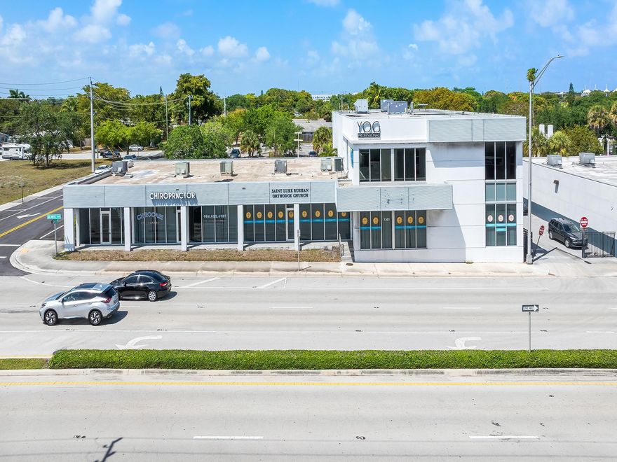 Currently approved for church use but open to office or retail concepts, this prime space in Pompano Beach’s commercial core offers exceptional visibility with direct frontage on a major thoroughfare. Recently renovated, the building features sleek floor-to-ceiling glass windows that fill the interior with natural light and create an open, welcoming environment—perfect for showcasing products or creating standout displays. With bold street presence and signage potential seen by over 40,000 vehicles daily, this high-impact location is ideal for creative offices, boutique retailers, or service-oriented businesses looking to stand out in a vibrant, high-traffic area.