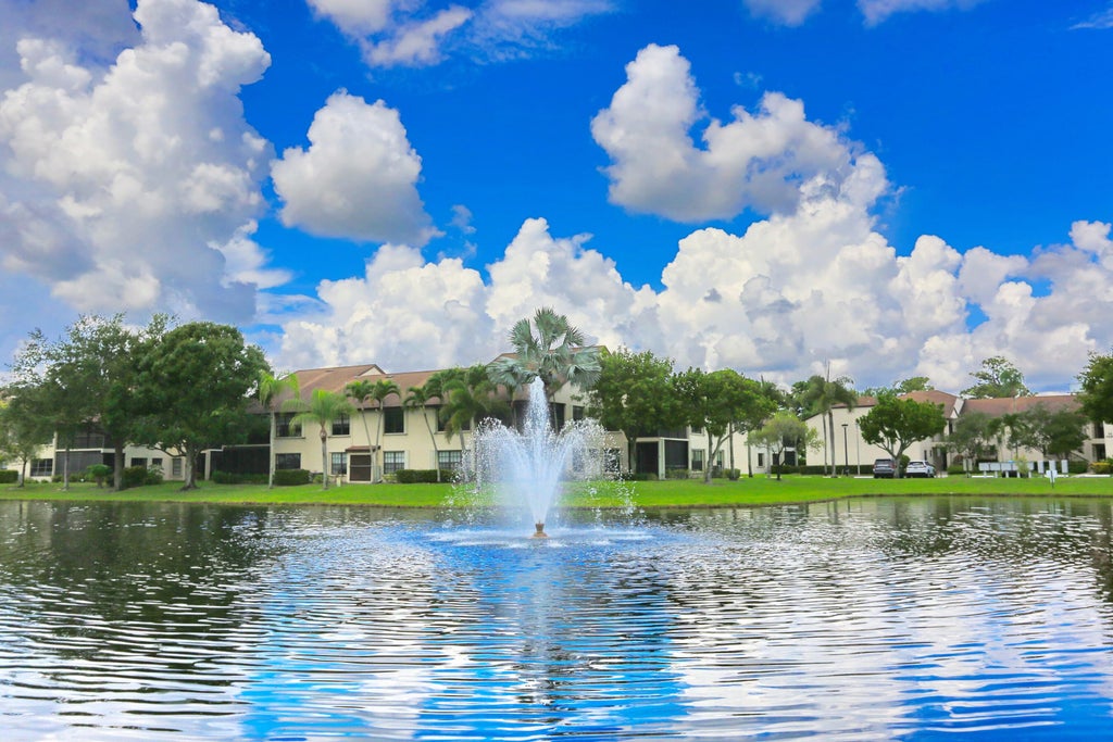 Photo of 3277 Jog Park Drive, Greenacres, FL 33467 (MLS # B26048801)