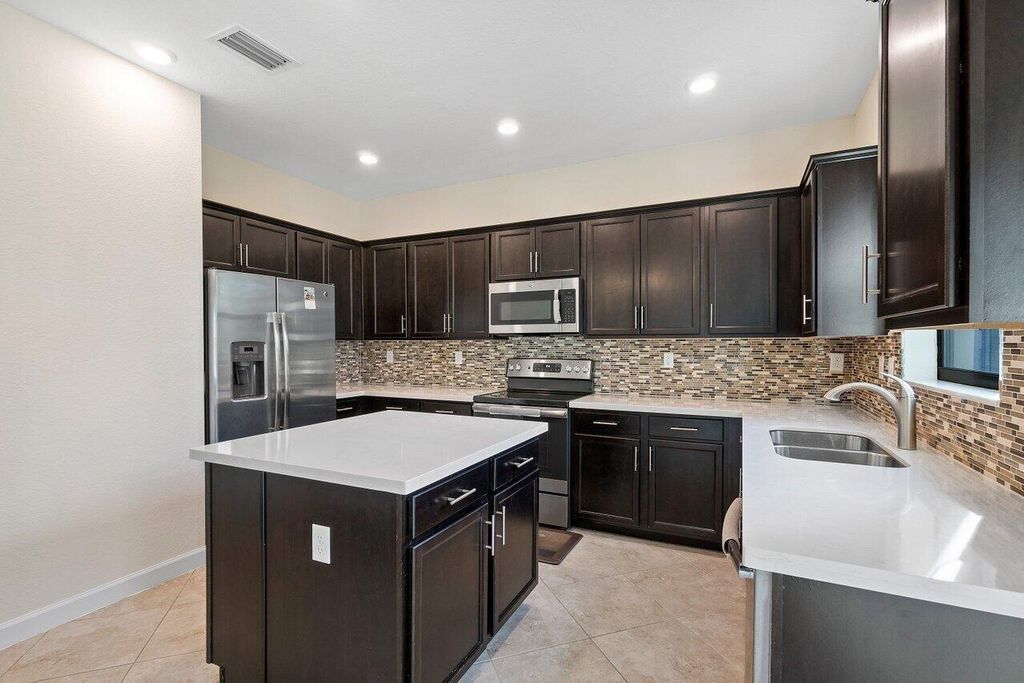 Photo of 5643 Sandbirch Way, Lake Worth, FL 33463 (MLS # R11169032)