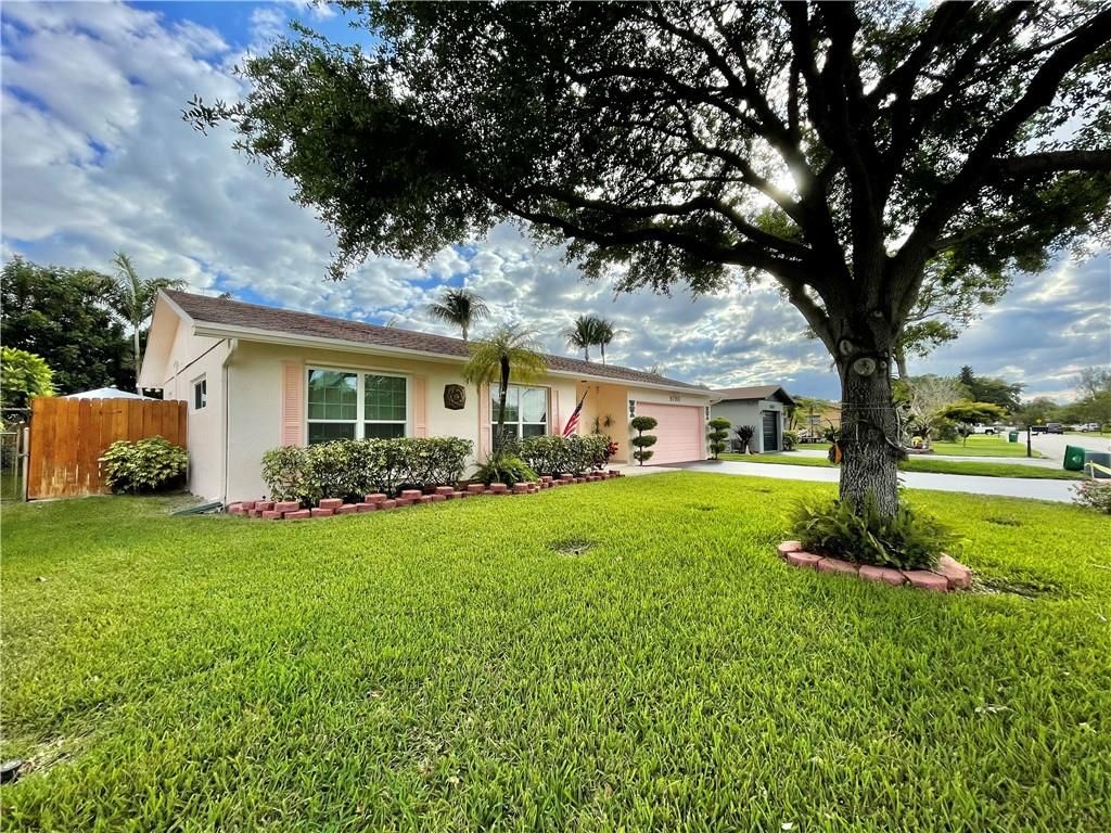 Photo of 9780 NW 24th St, Coral Springs, FL 33065 (MLS # F10276842)