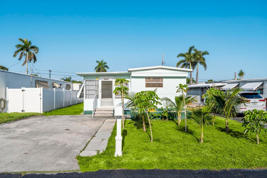 Welcome to 8489 Oak Street in Boynton Beach - a charming and budget-friendly manufactured home YOU OWN THE LOT, located in a quiet, well-maintained 55+ community, where all residents must meet the age requirement. This 2-bedroom, 2-bath home offers comfortable living with a practical layout and the added benefit that you own the land - no land lease! With a low HOA fee of just $100/month, which includes water, this home is a fantastic opportunity for anyone seeking a relaxed and affordable retirement lifestyle in sunny South Florida. Whether you're looking for a full-time residence or a seasonal getaway, this property provides exceptional value. Conveniently located near shopping, dining, medical facilities, and the beach, 8489 Oak Street offers peaceful living in a prime location.