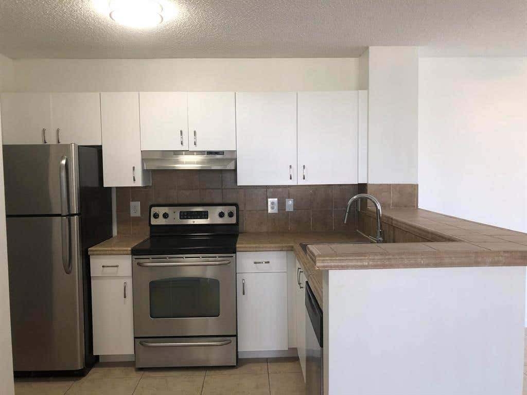 Photo of 1755 Village Boulevard Blvd #102, West Palm Beach, FL 33409 (MLS # R10803109)