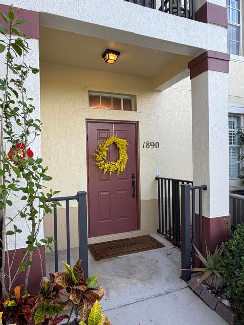 Photo of 1890 SE Interlachen Drive, Port Saint Lucie, FL 34952 (MLS # B26046244)