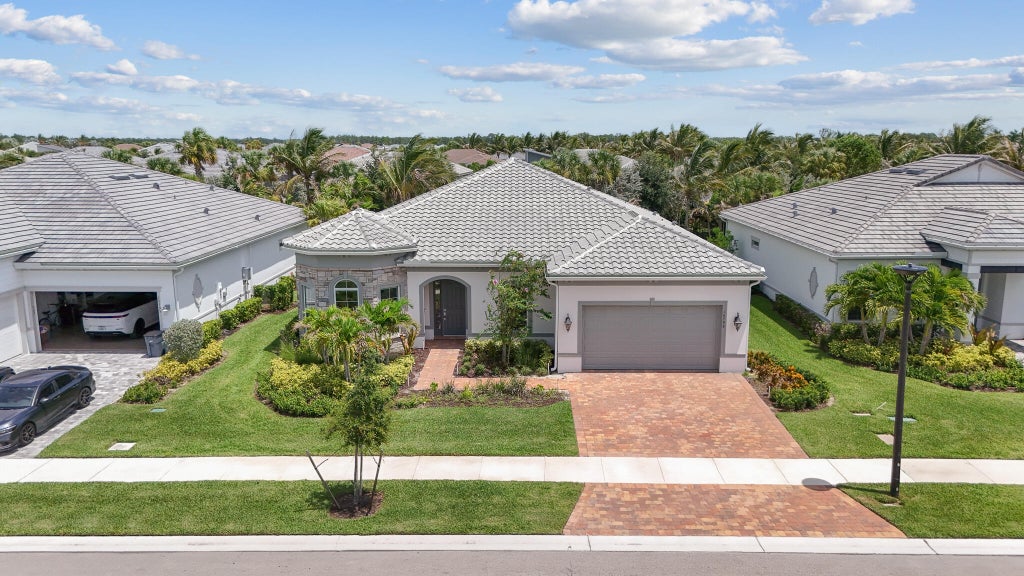 Photo of 10799 STELLAR Circle, Palm Beach Gardens, FL 33412 (MLS # B26059942)